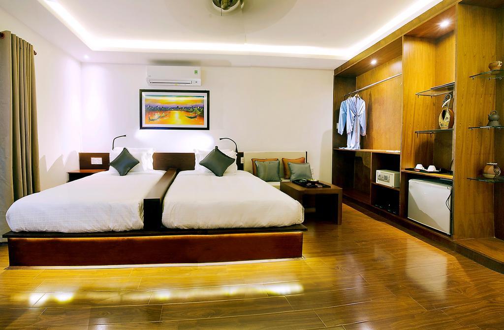 Azumi Hotel Hoi An Quarto foto